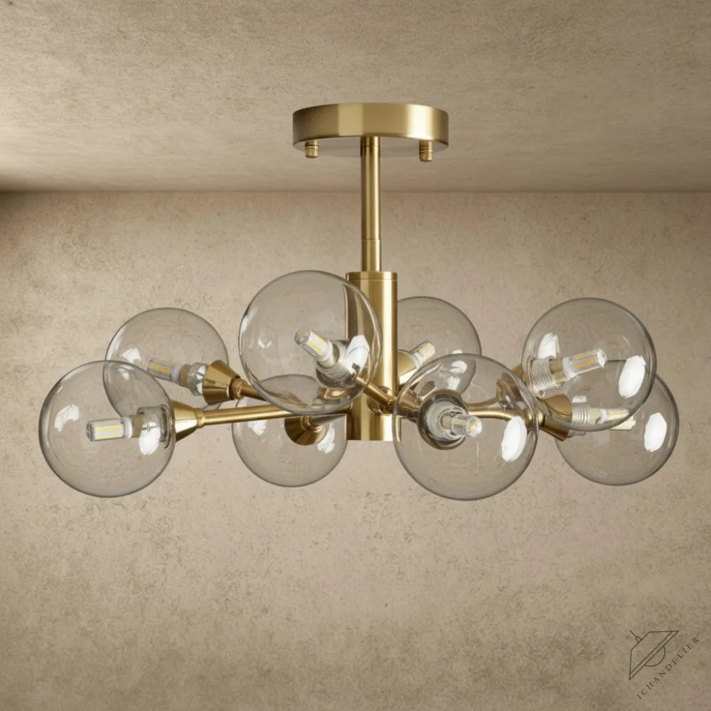 ichandelier Apollo Flush Mount 20/36/47 inch, 8-light brass semi-flush mount with clear glass globe shades.