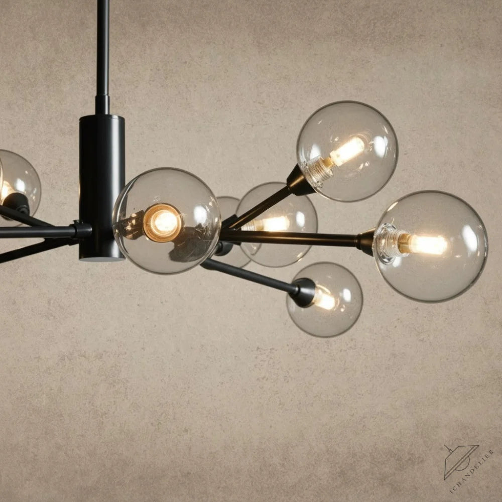 ichandelier Apollo Round Chandelier, black metal frame with clear glass globe shades and exposed bulbs.