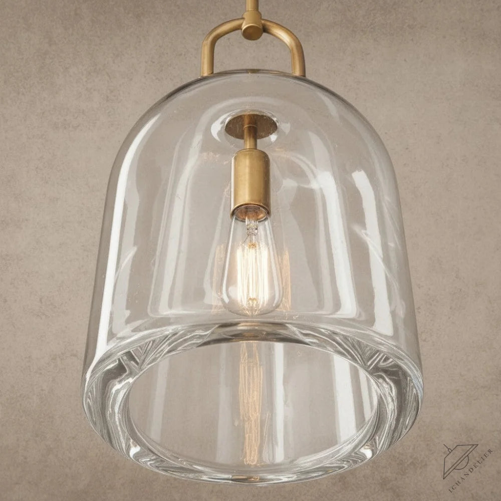 ichandelier Botanist Cloche Pendant, clear glass bell shade with brass hardware and exposed Edison bulb