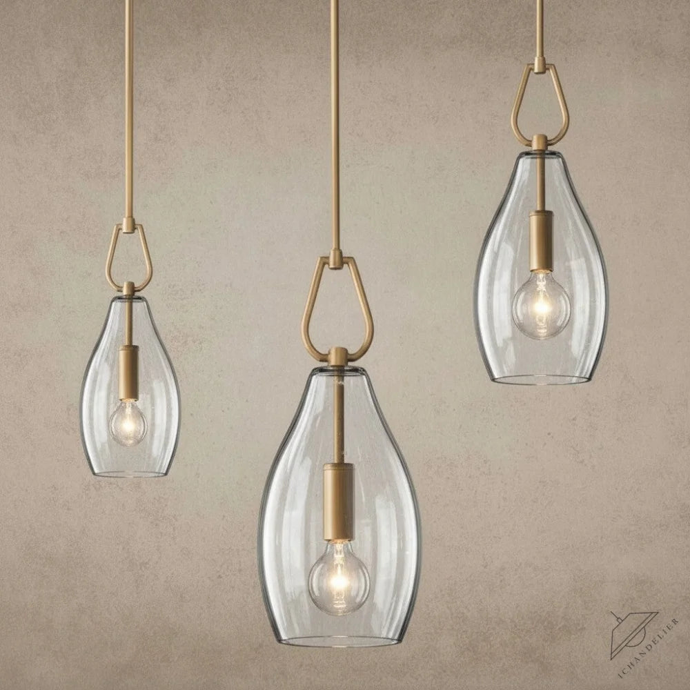 ichandelier Botanist Flute Pendant, clear glass teardrop shade with textured details, brass hardware, modern lighting