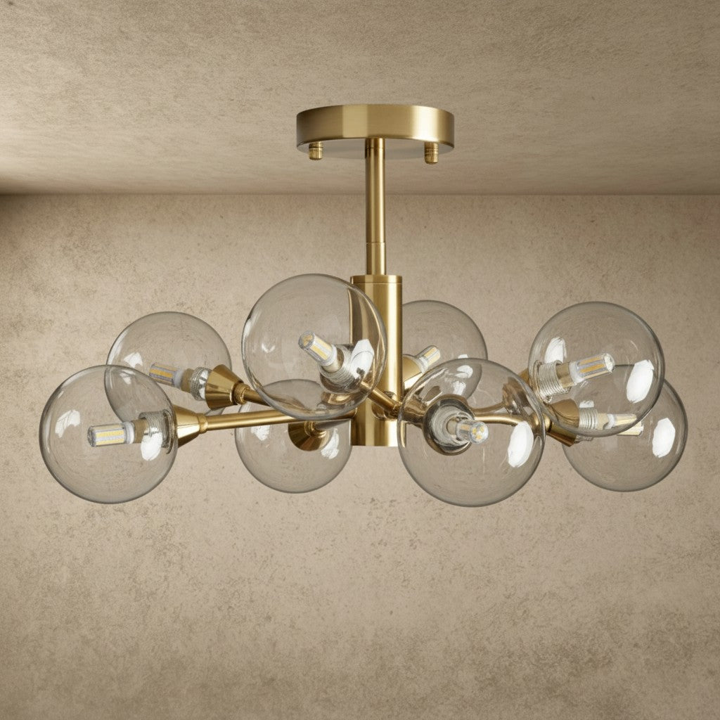 ichandelier Apollo Flush Mount 20/36/47 inch, 8-light brass semi-flush mount with clear glass globe shades.