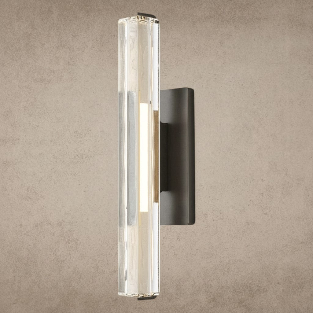 ichandelier Audubon Crystal Single Sconce, clear glass cylinder with textured interior, mounted on dark metal base