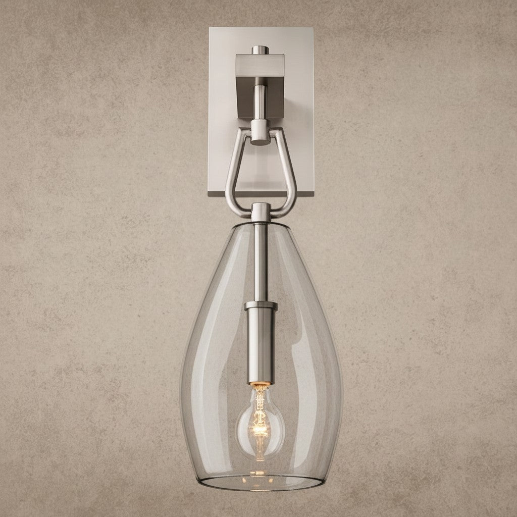 ichandelier Botanist Flute Sconce, modern brushed nickel wall light with clear glass shade and exposed bulb.