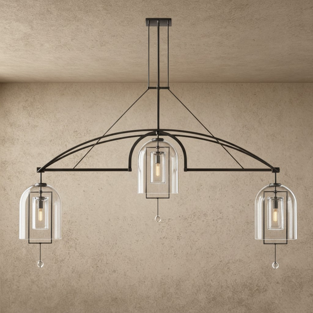 ichandelier Fulcrum Grand Linear Chandelier, modern arched frame with three clear glass bell shades and exposed bulbs.