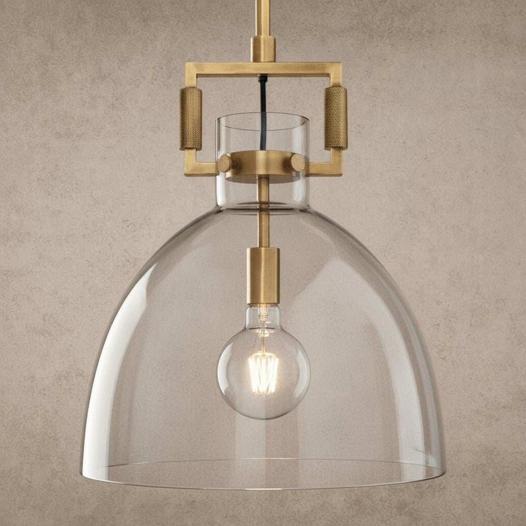 ichandelier Machinist Glass Cloche Pendant, clear glass dome shade with brass hardware and exposed bulb.