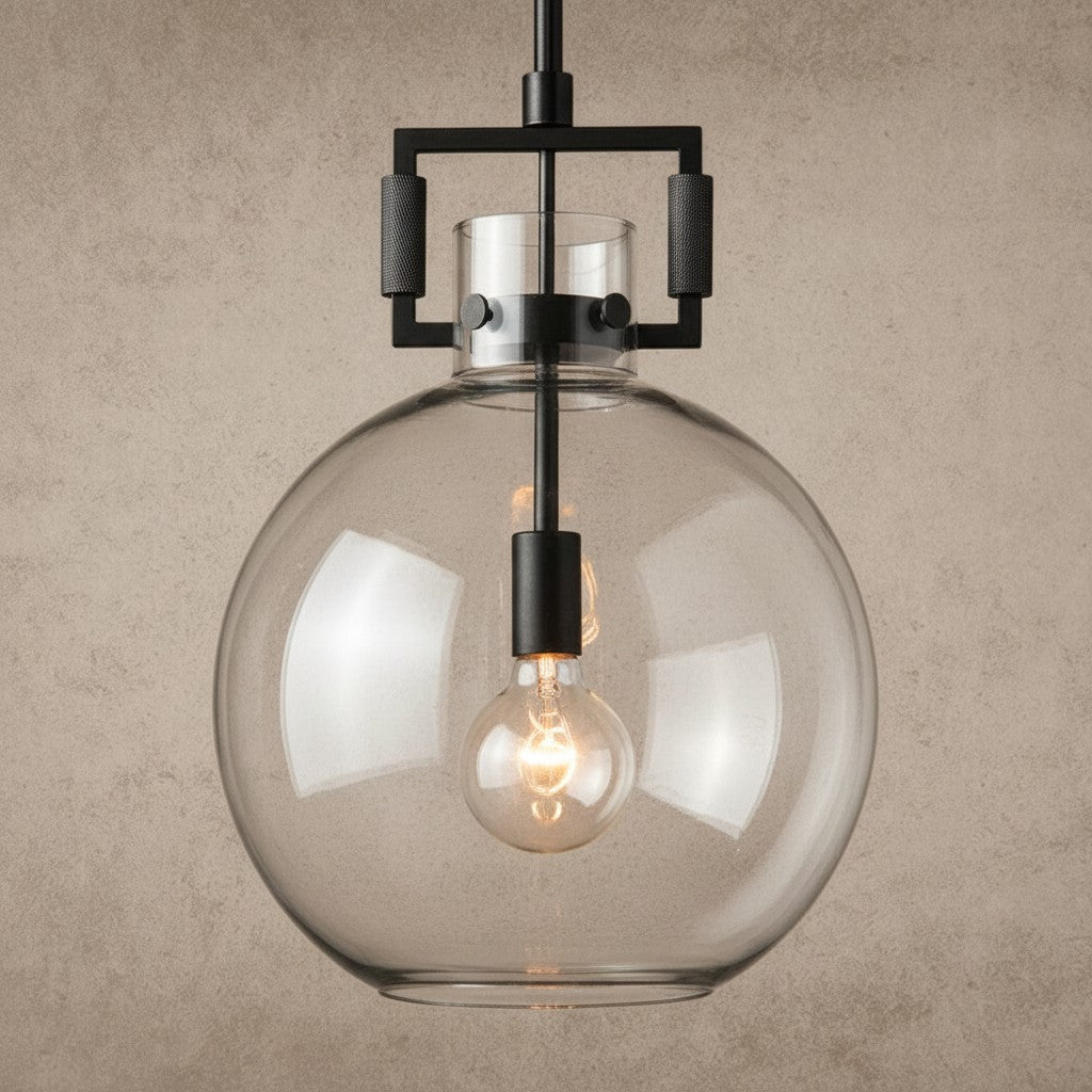 ichandelier Machinist-Glass-Globe-Pendant, clear glass globe pendant with exposed bulb and dark metal accents.