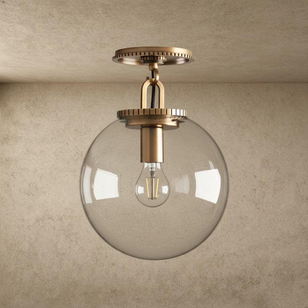 ichandelier Wescott Globe Flush Mount, clear glass shade with brass hardware and exposed Edison bulb