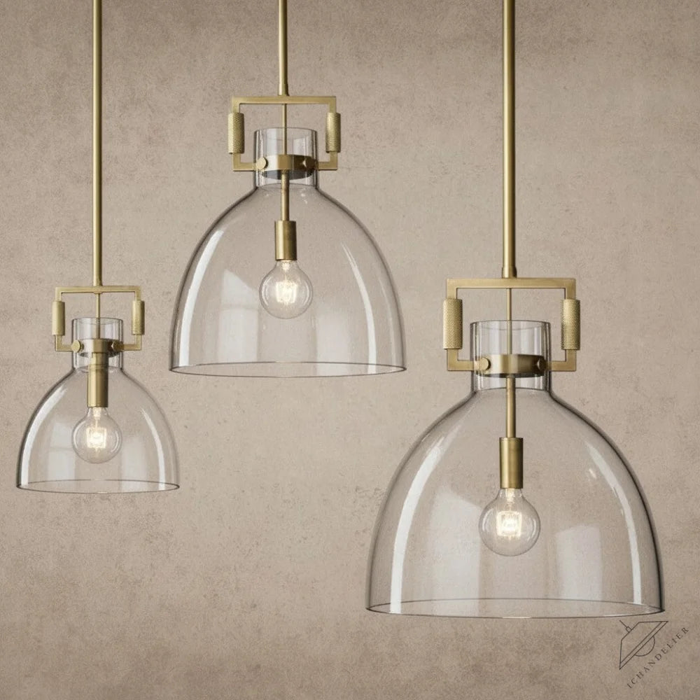 ichandelier Machinist Glass Cloche Pendant, clear glass dome shade with brass hardware, available in 10, 14, 18 inch sizes.