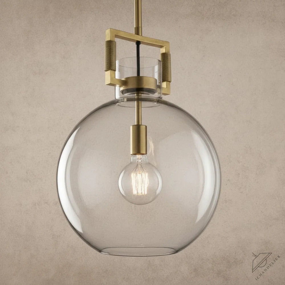 ichandelier Machinist-Glass-Globe-Pendant, clear glass globe pendant with brass hardware and exposed bulb.