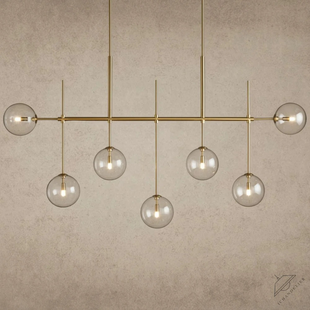 ichandelierHere Roscoe Linear Chandelier 60” 72” with brass finish and clear glass globes, modern design.