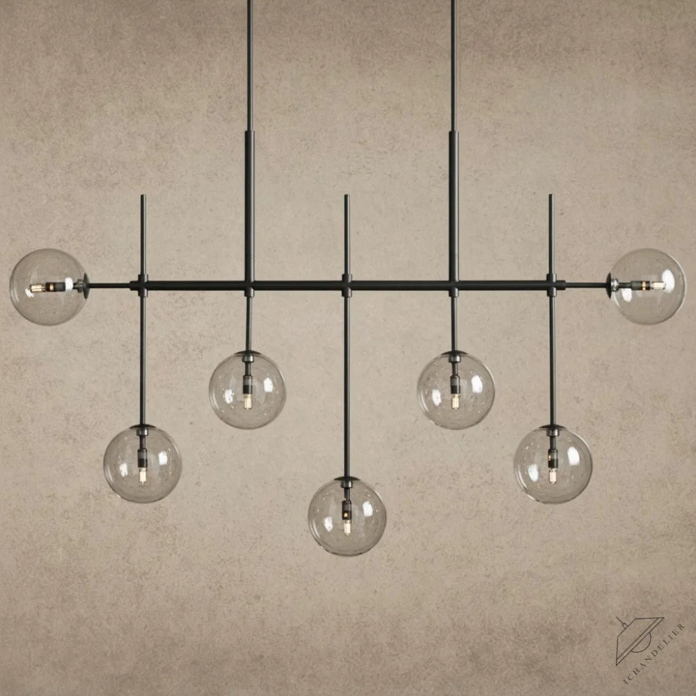 ichandelierHere 60”/72” Roscoe Linear Chandelier with clear glass globes and black metal frame, modern design.
