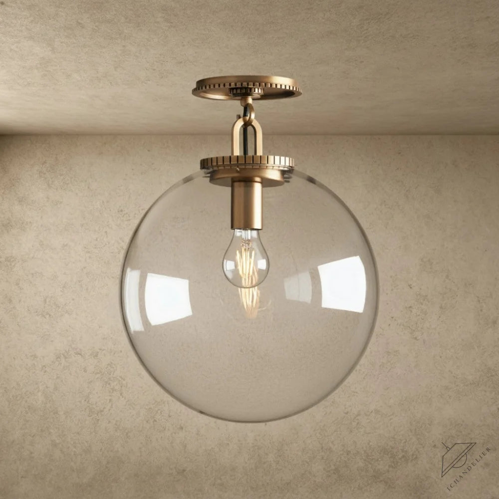 ichandelier Wescott Globe Flush Mount, clear glass shade, brass hardware, exposed bulb, modern ceiling light