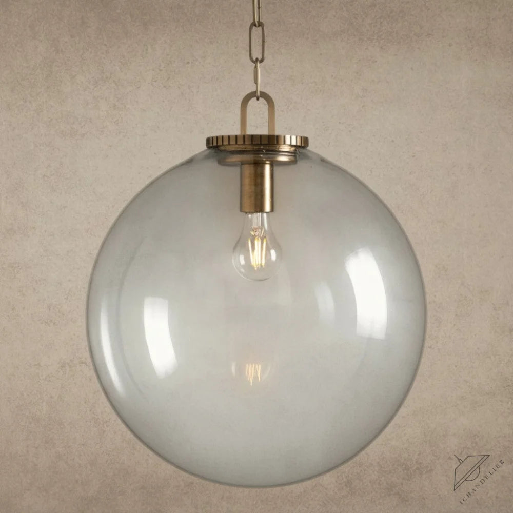 ichandelier Wescott Globe Pendant with Chain, clear glass shade, brass hardware, exposed bulb, modern industrial style