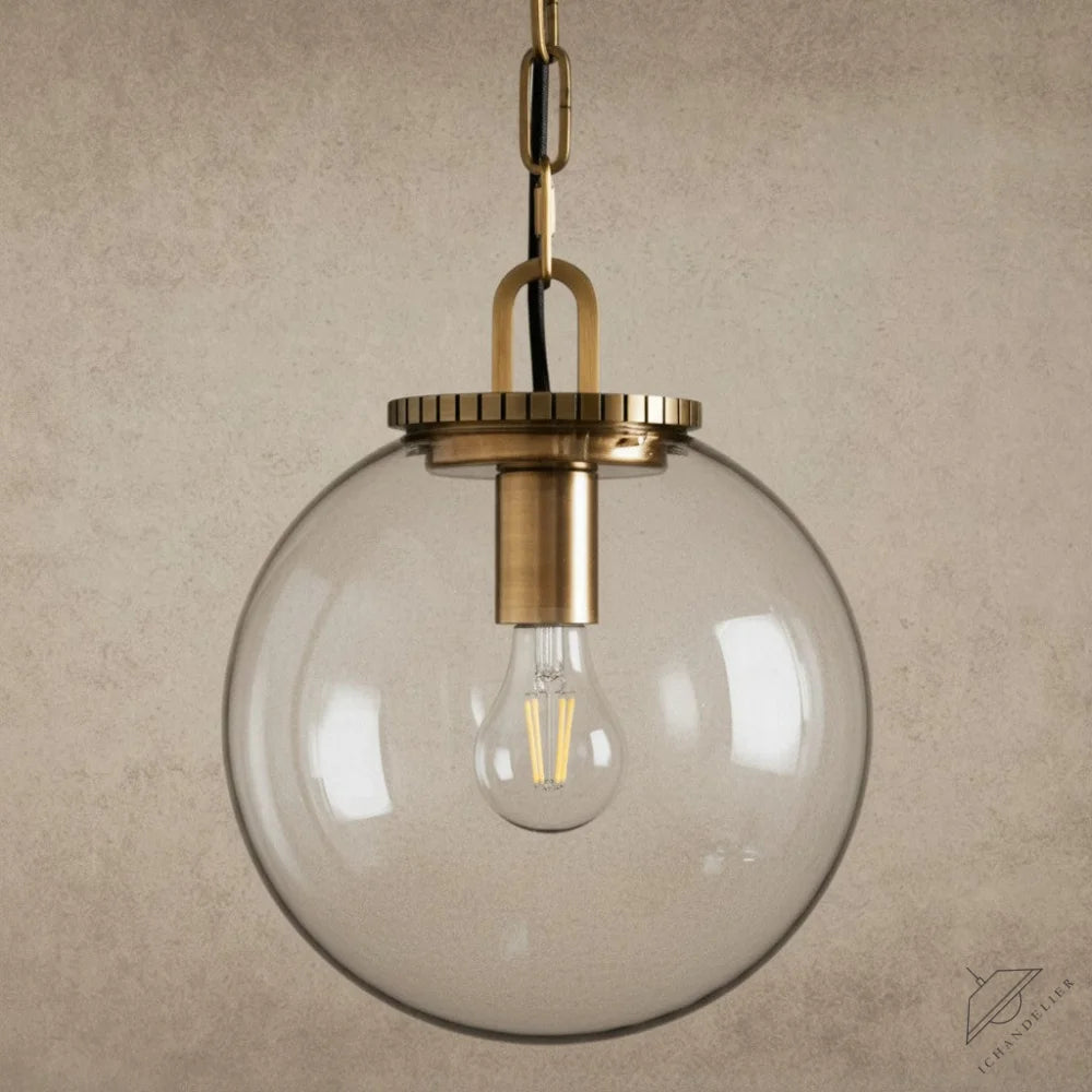 ichandelier Wescott Globe Pendant with Chain, clear glass shade, brass hardware, exposed filament bulb, modern industrial style